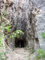 Hunter examines an old mining cave near the start.jpg